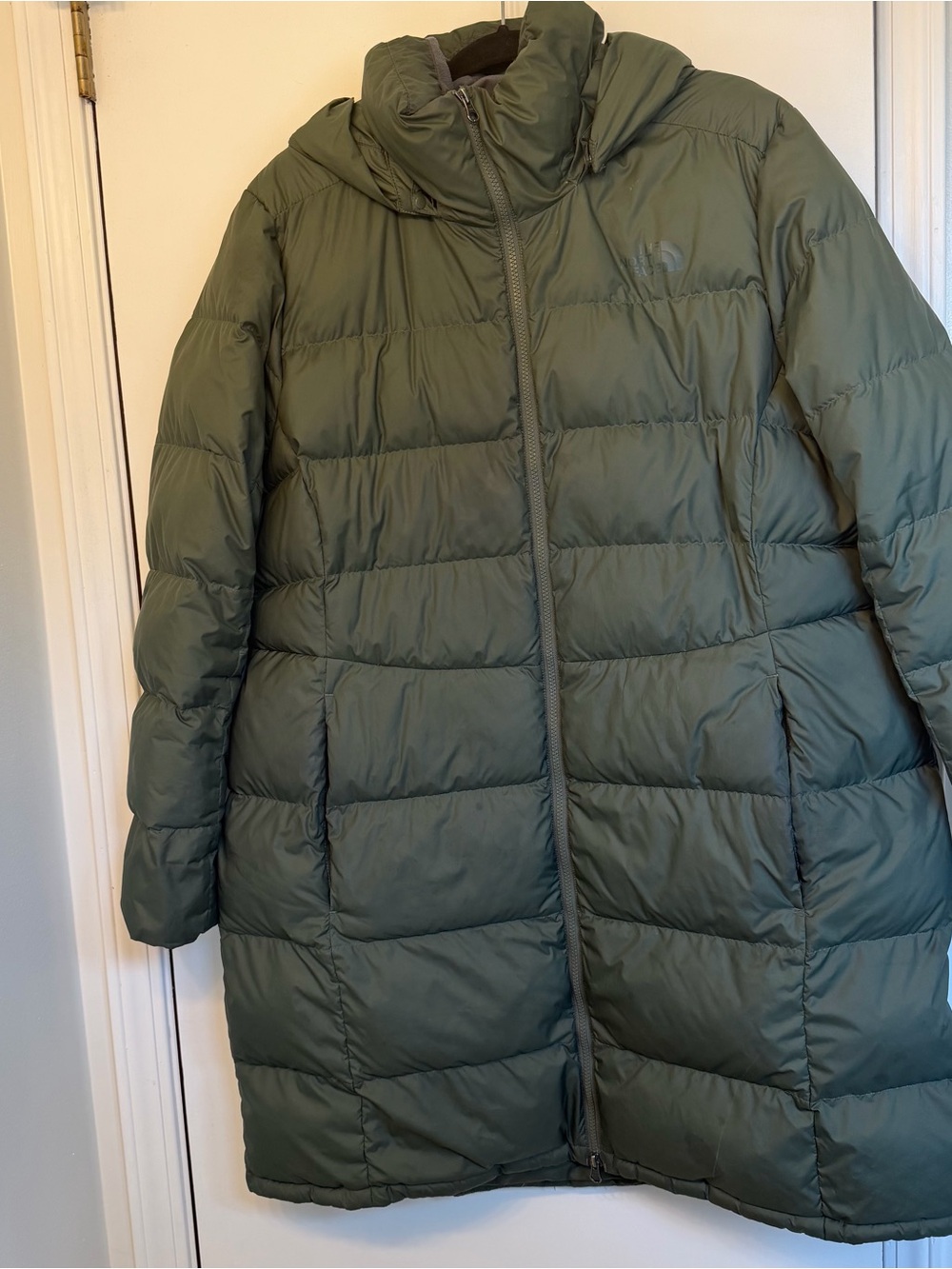 The North Face Women’s Metropolis Parka-  Down knee length puffer coat.
